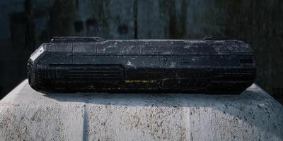 A futuristic military crate resting on a stone surface photo