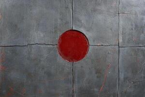 Abstract gray tile background with red circle photo