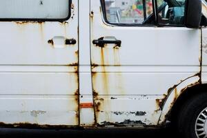 rust and corrosion of the car door photo