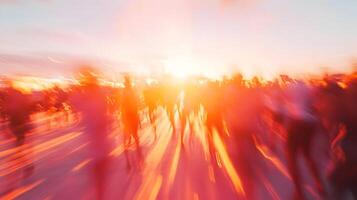 Energetic crowd of people walking towards bright light with motion blur effect photo