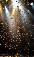 Celebration with falling golden confetti under spotlights for festive occasions photo