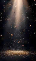 Golden confetti falling on a dark background with a spotlight shining down on celebration photo