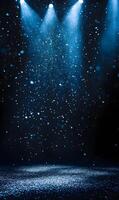 Dramatic spotlight illuminates dust particles creating a stage for a performance photo