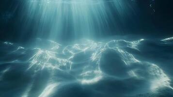Underwater Sunlight Illuminating the Seabed Creating a Mesmerizing Ocean Scape Scene photo