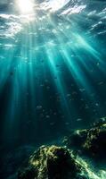 Underwater Sun Rays, A Serene Scene of Light Beams Dancing Through the Ocean Depths photo