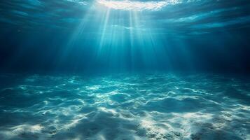 Underwater Sunlight Filtering Through the Ocean Surface illuminating the seabed photo