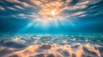 Underwater Sunlight Illuminating the Ocean Floor with Serene Light Rays and Reflections photo