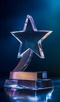 Elegant crystal star trophy gleaming with a subtle blue light on a reflective surface photo