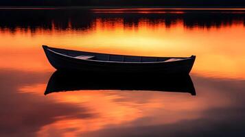 A tranquil sunset reflection on the lake with a boat casting an ethereal glow photo
