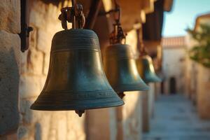 Old bronze bells hanging in a monastery photo