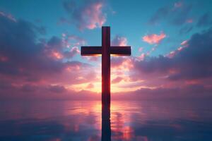 Large wooden cross standing in calm water during sunset with colorful clouds photo