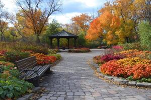 Cobblestone path leading to gazebo in colorful autumn park photo