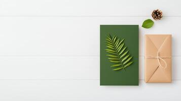 A green leaf is on top of a brown card photo