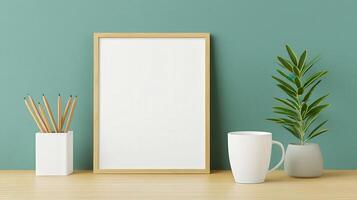 A white frame sits on a wooden desk with a cup and a vase of plants photo