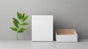A white box with a green leaf next to it photo