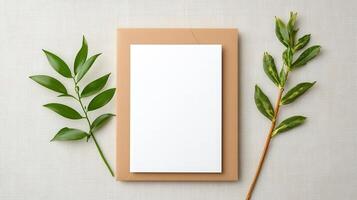 A white square with a leaf on top of it photo