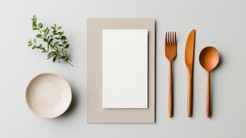 A white paper with a fork and knife on it photo
