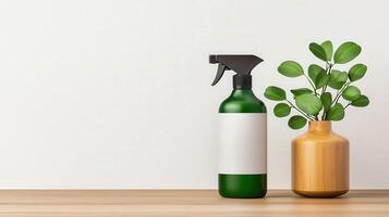 A green bottle of spray sits on a wooden table next to a potted plant photo