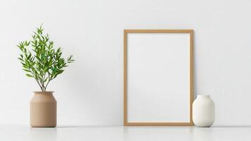 A white frame sits on a table next to a vase and a potted plant photo