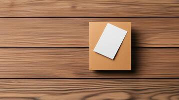 A white piece of paper is on top of a brown box photo