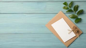 A white card with a leaf on top of it photo