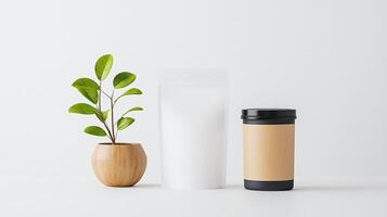 A white bag and a brown cup sit on a table next to a potted plant photo