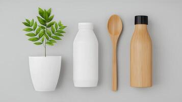 A white bottle, a spoon and a plant are displayed on a grey surface photo