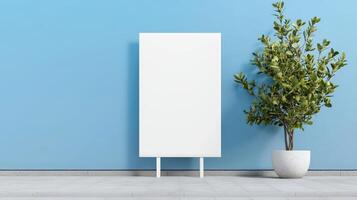 A white sign is standing in front of a blue wall photo