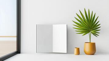 A white open book sits on a shelf next to a potted plant photo