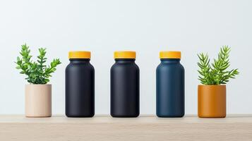Three bottles of medicine sit on a shelf next to three potted plants photo