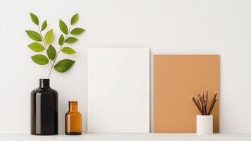 A white frame sits on a shelf next to a vase and a jar photo