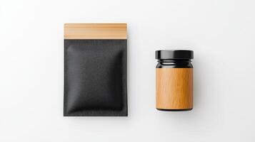 A black bag and a jar of jam are displayed on a white background photo