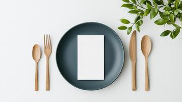 A plate with a fork, knife, and spoon on it photo