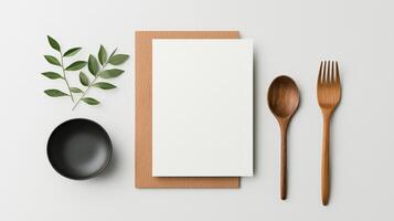 A minimal white paper with a spoon and fork on it photo