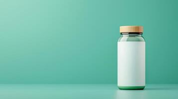 A bottle of medicine sits on a green background photo