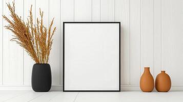 A black frame with a white background sits on a white wall photo