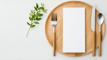 A wooden plate with a fork, knife, and spoon on it photo