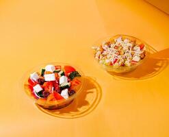Fresh salads with colorful ingredients on a vibrant background photo