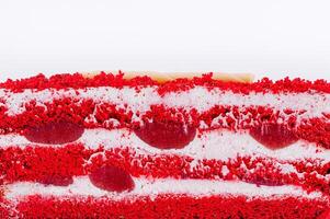 Layered red velvet cake with cherries and cream filling photo