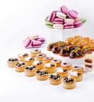 Delectable desserts displayed on a white background for treat lovers photo