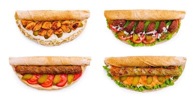 Various types of delicious sandwiches displayed on a white background photo