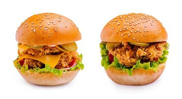 Delicious fried chicken burgers with fresh toppings and sesame buns photo