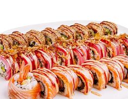 Elegant sushi rolls with assorted fish and toppings photo