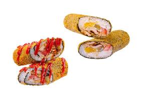 Unique sushi rolls with crispy exterior and vibrant toppings photo