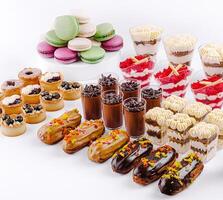 Colorful dessert display featuring assorted pastries and sweets photo