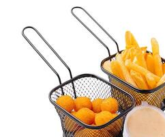 Crispy snacks served in wire baskets with dipping sauce photo