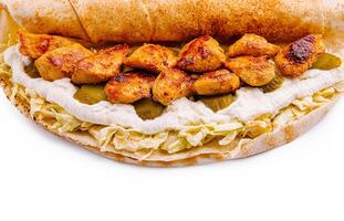 Chicken sandwich with fresh vegetables and creamy sauce photo