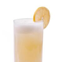 Refreshing lemon beverage served in a tall glass photo
