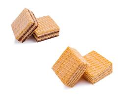 Crispy wafer cookies stacked on a white background photo