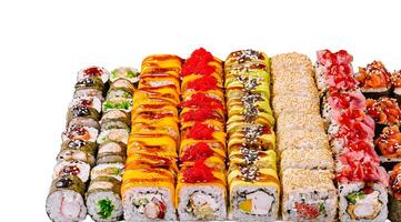 Variety of colorful sushi rolls arranged on a white background photo